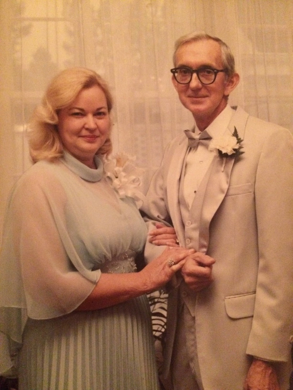 George and Sallie posing in formal dress.